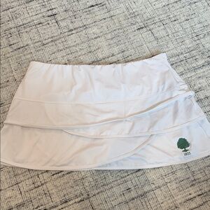 White Skirt with Green Logo
